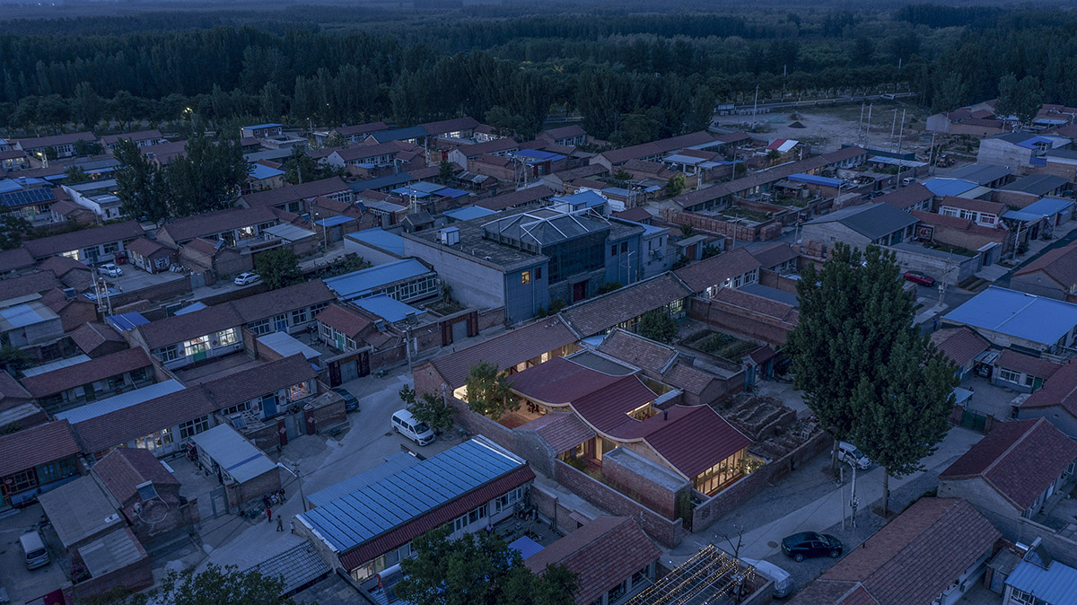 Archstudio renovates Beijing's old courtyard house with new wooden additions 