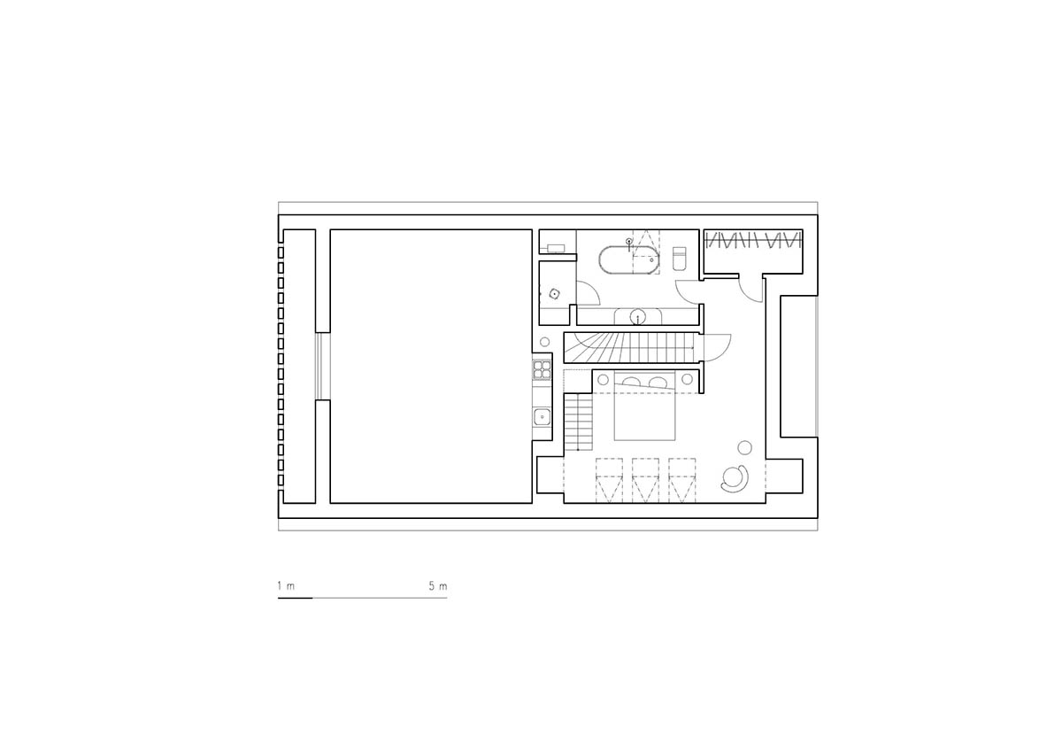 Jan Žaloudek Architekt converts a Baroque barn into a light-filled house with perforated gable wall