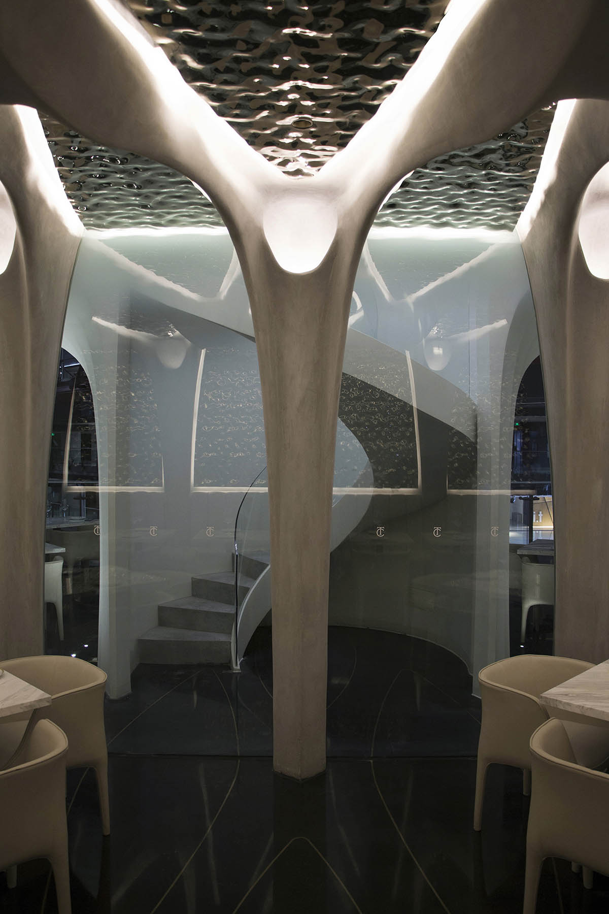 CAA Architects creates flower-like double-deck terrace in the interior of restaurant in Beijing