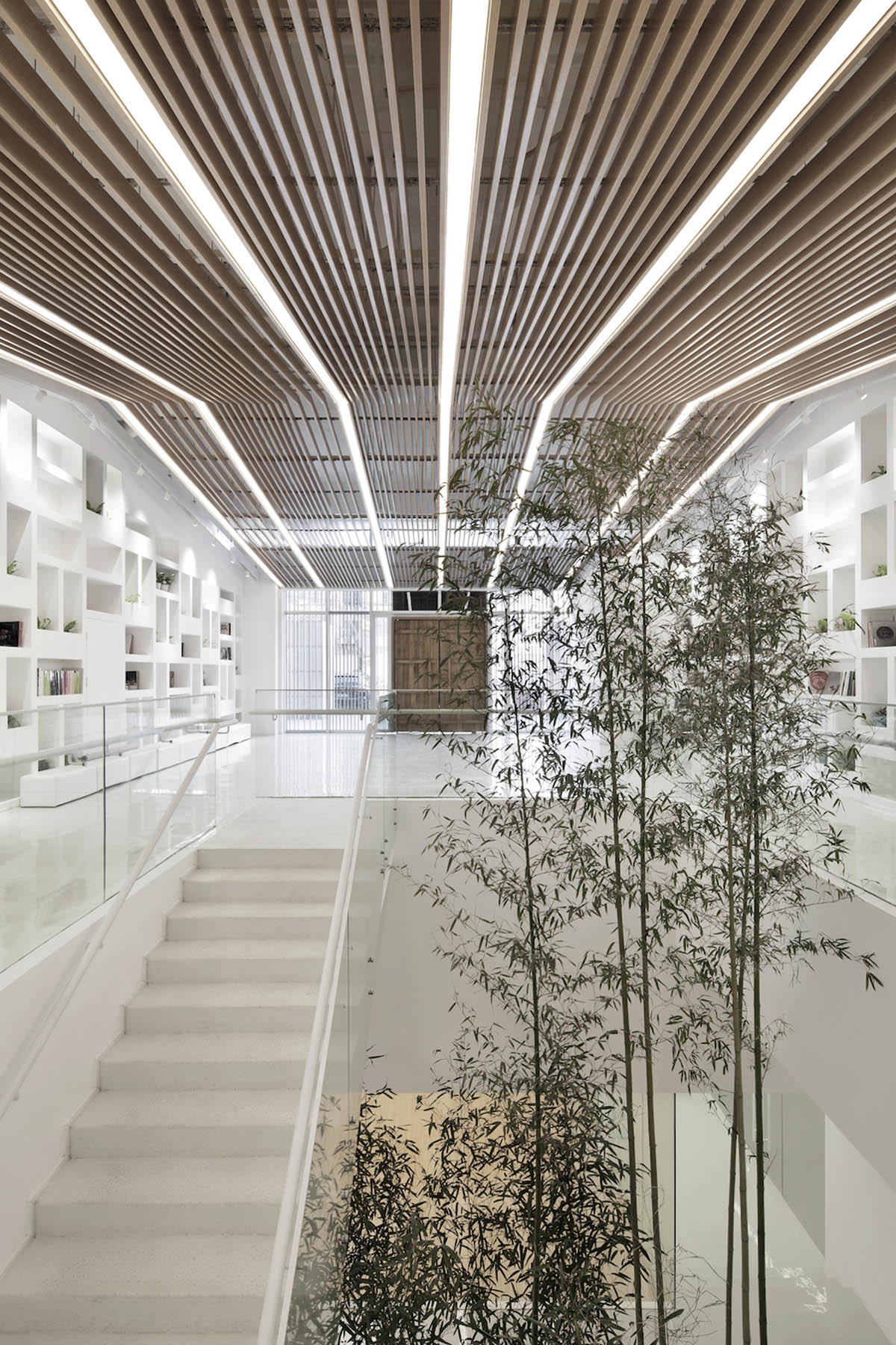 ARCHSTUDIO&rsquo;s new Children Education Institution features bamboo strips and white library wall