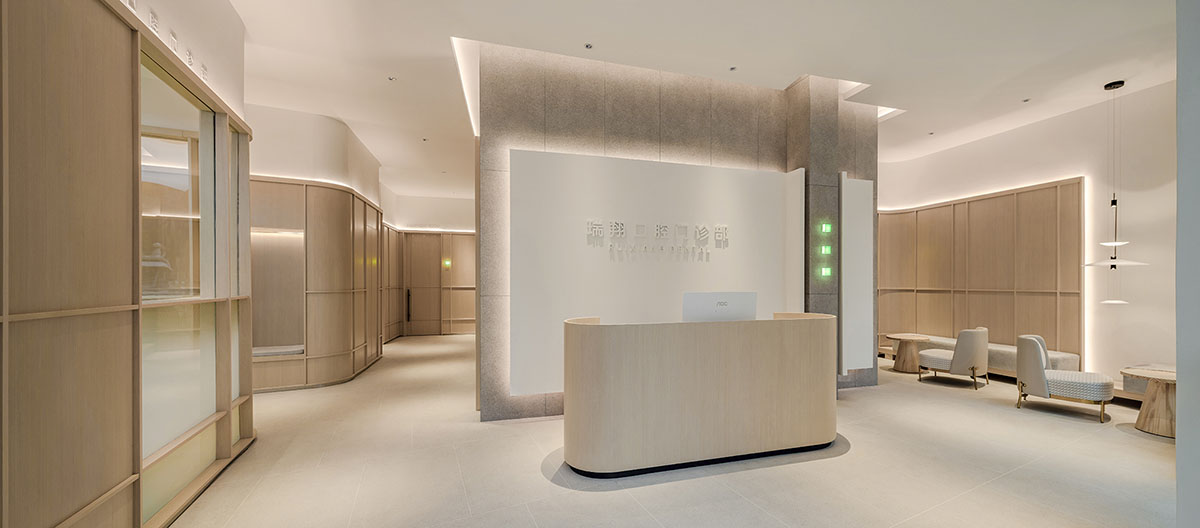 JACKY.W DESIGN completes dental clinic with rounded wooden walls and natural tones in China 
