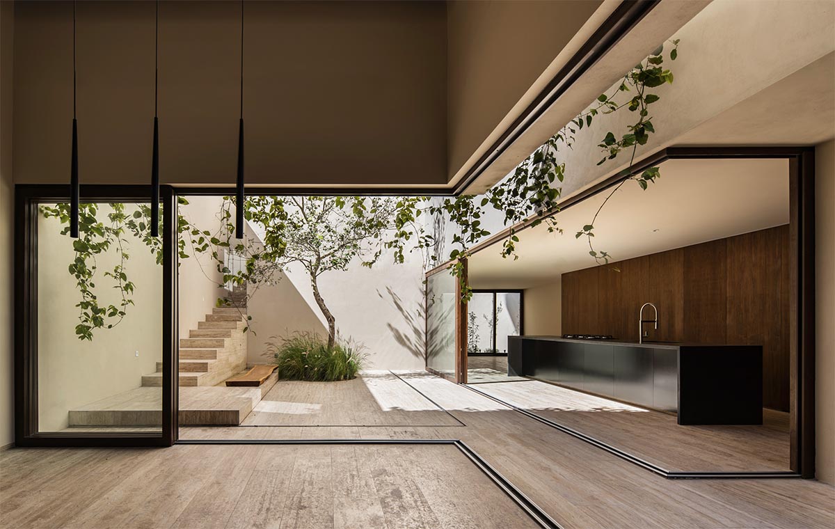 Sabino 10 residence by Editorial features a solid façade with hermetic volumes in Mexico