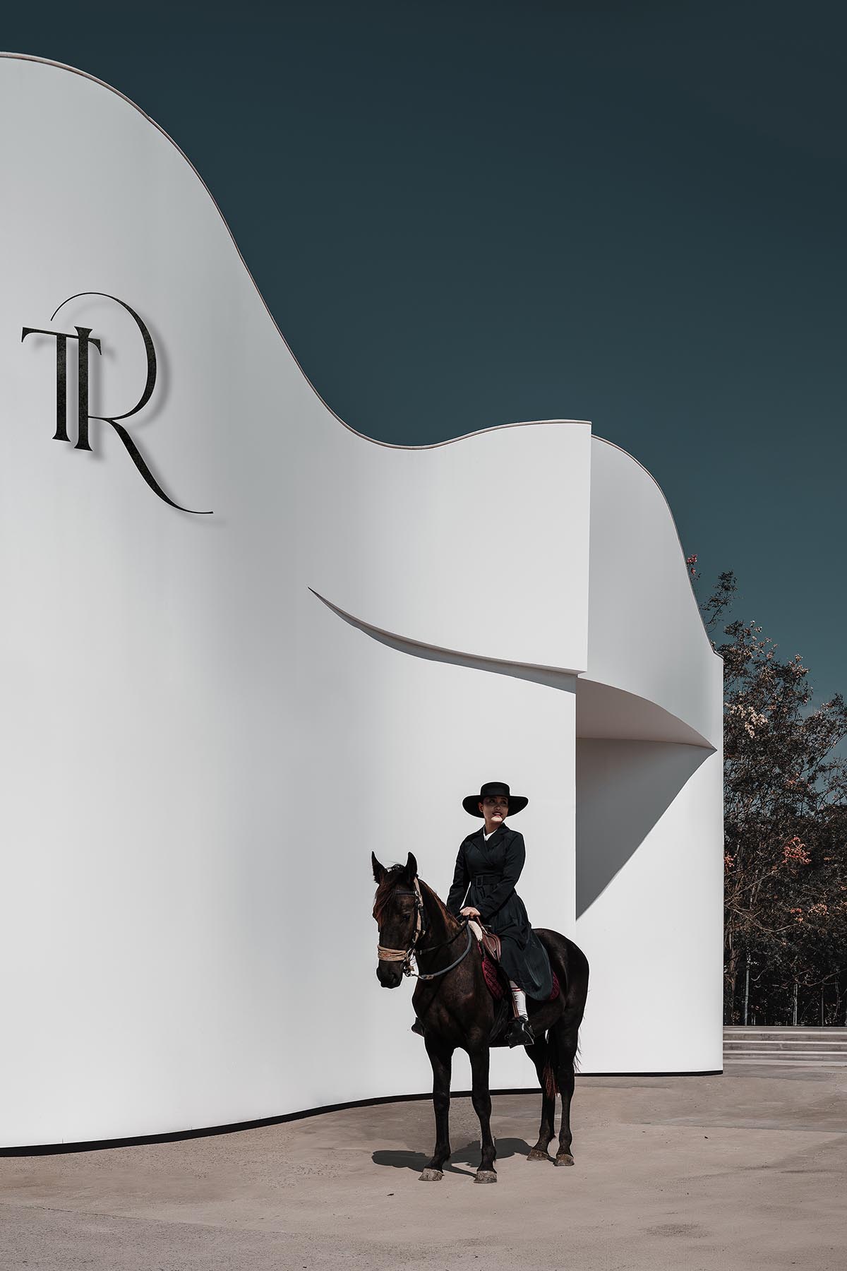 Chinese chapel creates a fluid silhouette featuring curving walls to mimic blossoming petals 