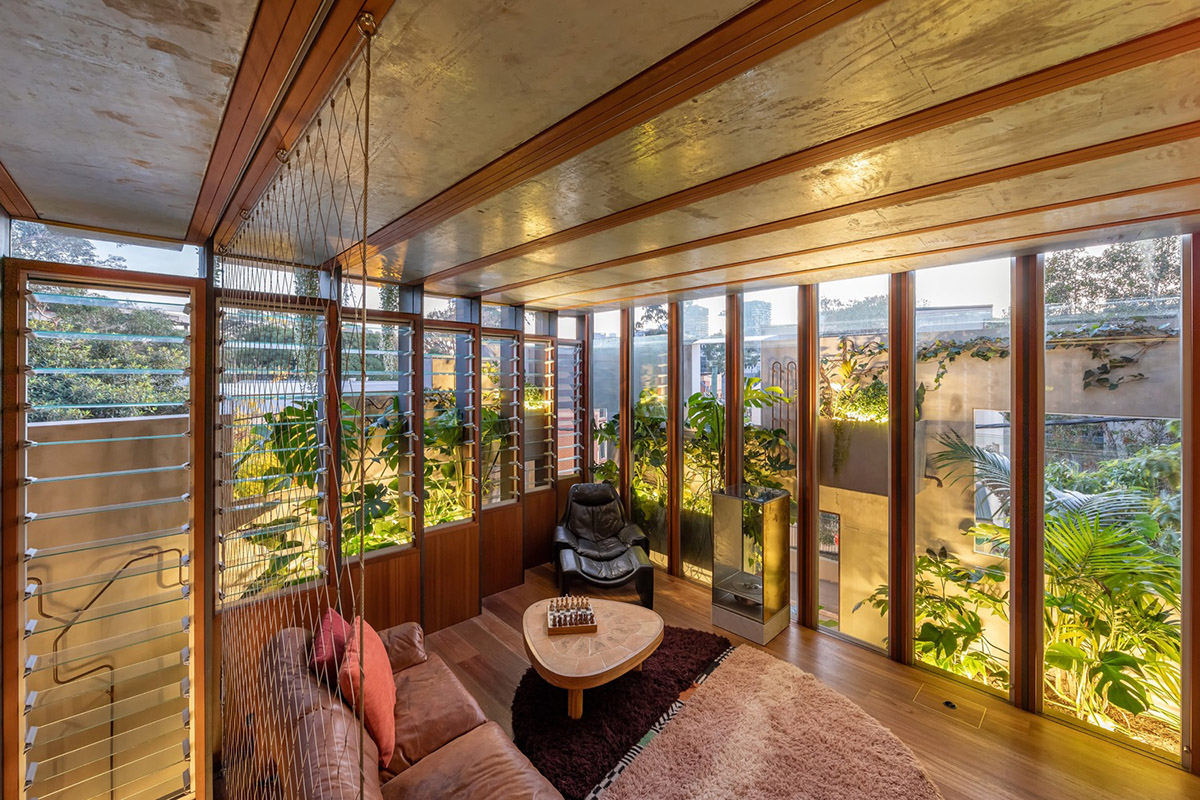 CplusC Architectural Workshop rejuvenates old shop house with blow up green infills in Australia