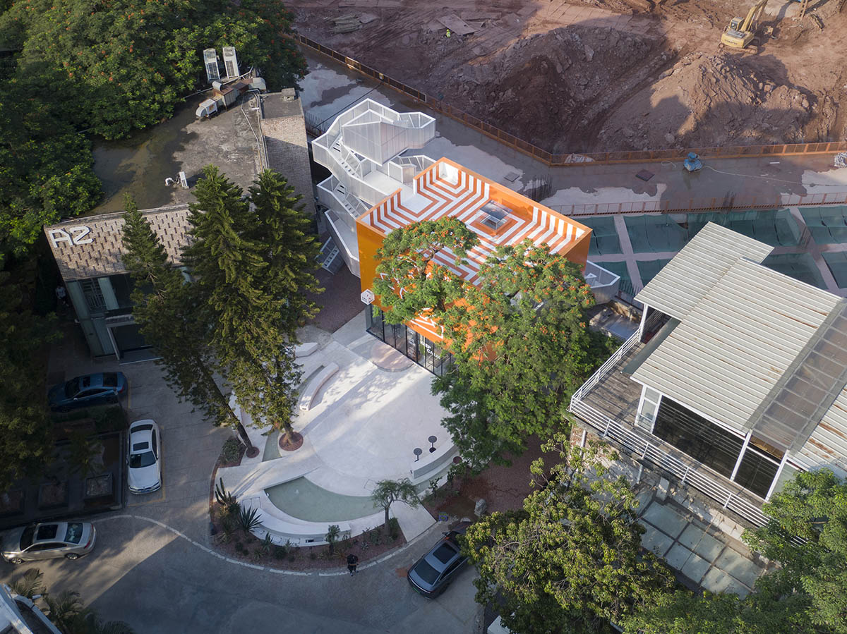Wutopia Lab completes orange-colored vertical micro social complex with light tower in Guangzhou