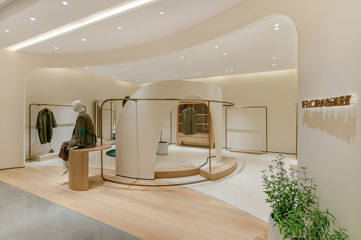 JYDP designs retail space with warm tones and curved walls in Shanghai