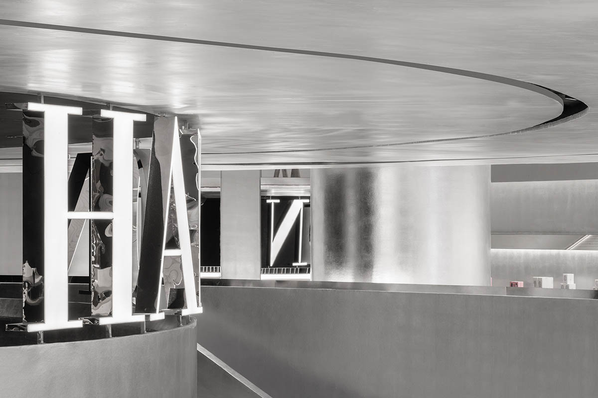 Various Associates designs beauty store with winding staircase and silver-toned interiors in Hangzhou