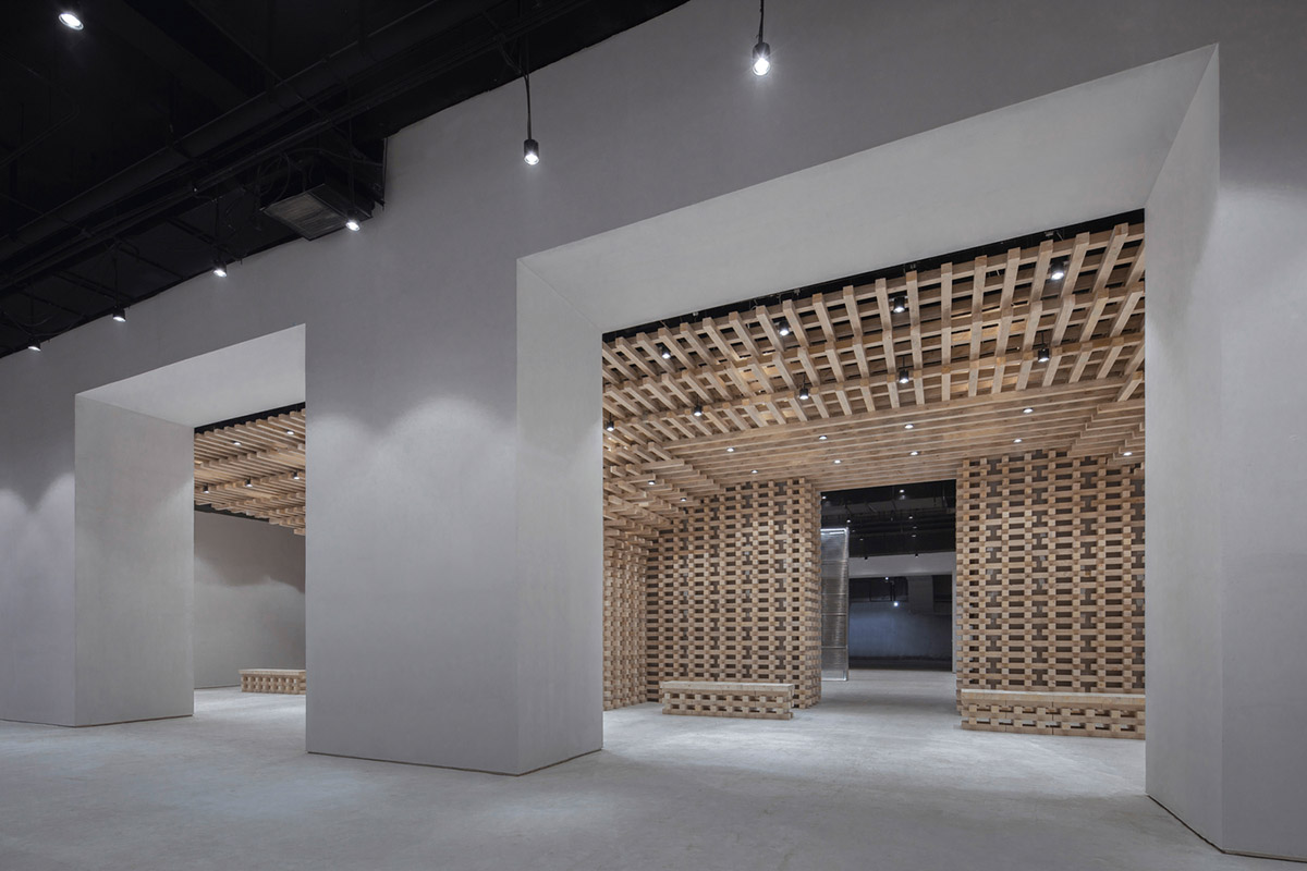 BANDe Architects combines greyscale interior with gridded wooden structures for GreenMonster Lab
