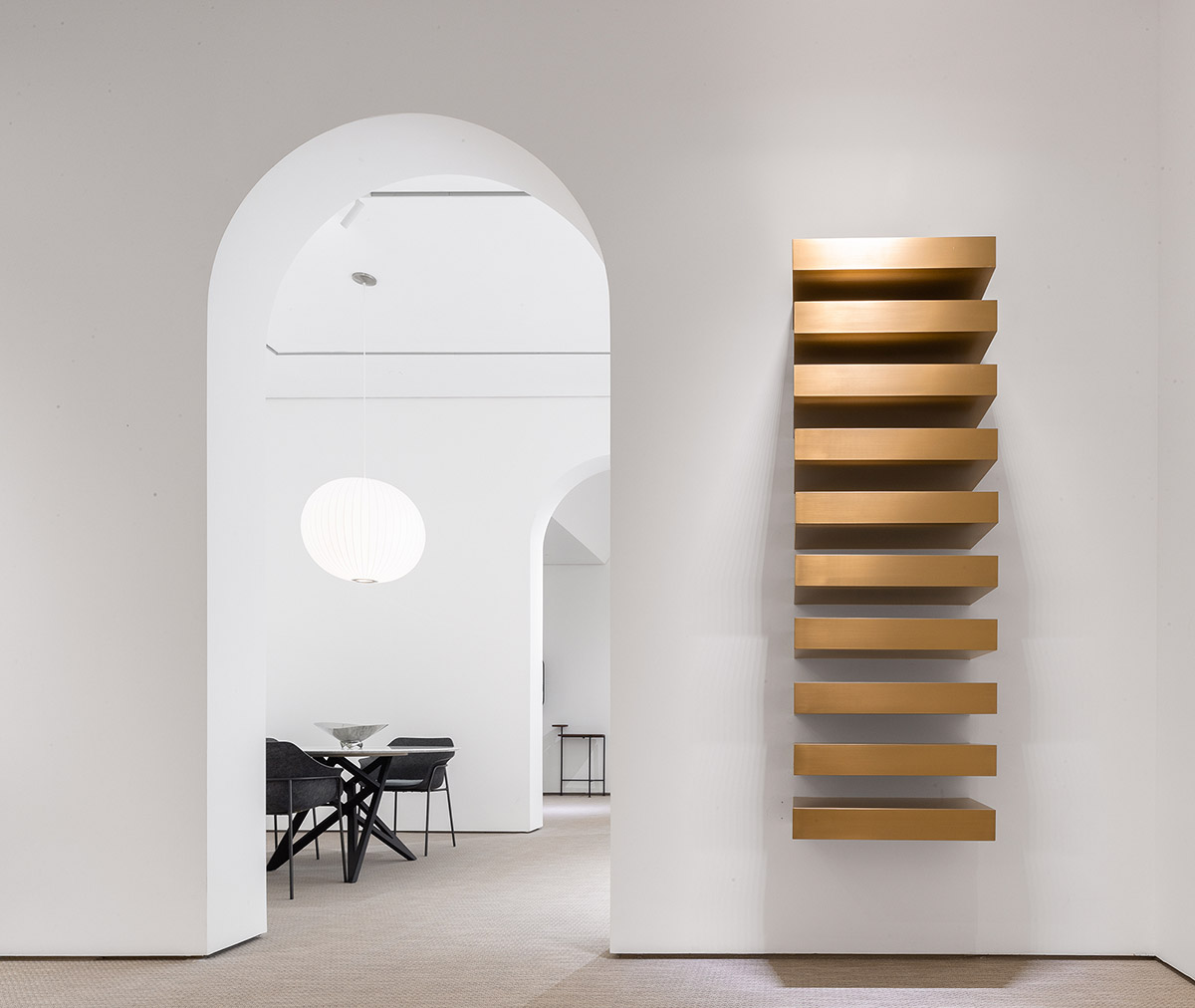Peng & Partners designs showroom with continuous arches and themed spaces in Guangzhou