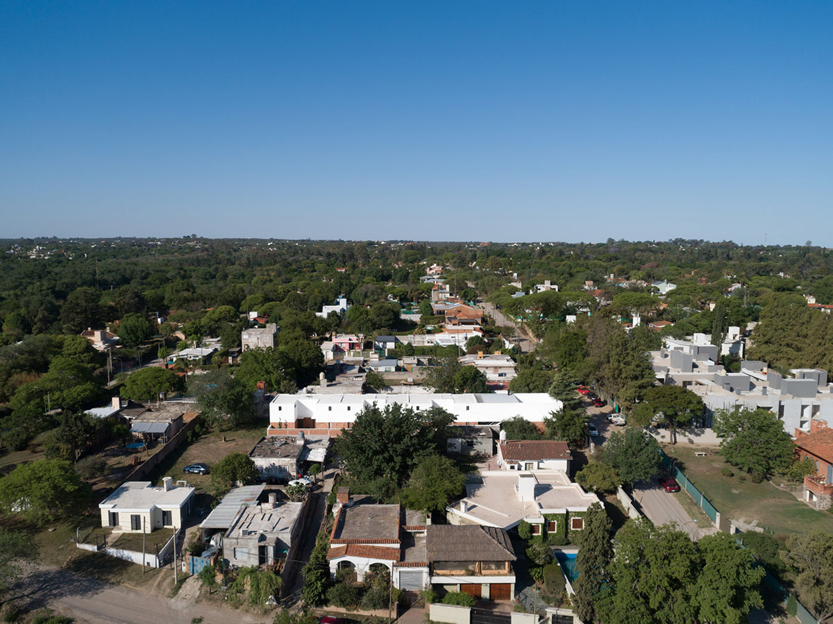 Andres Alonso Architecture Workshop completes La Inesita houses with tall brick base in Cordoba