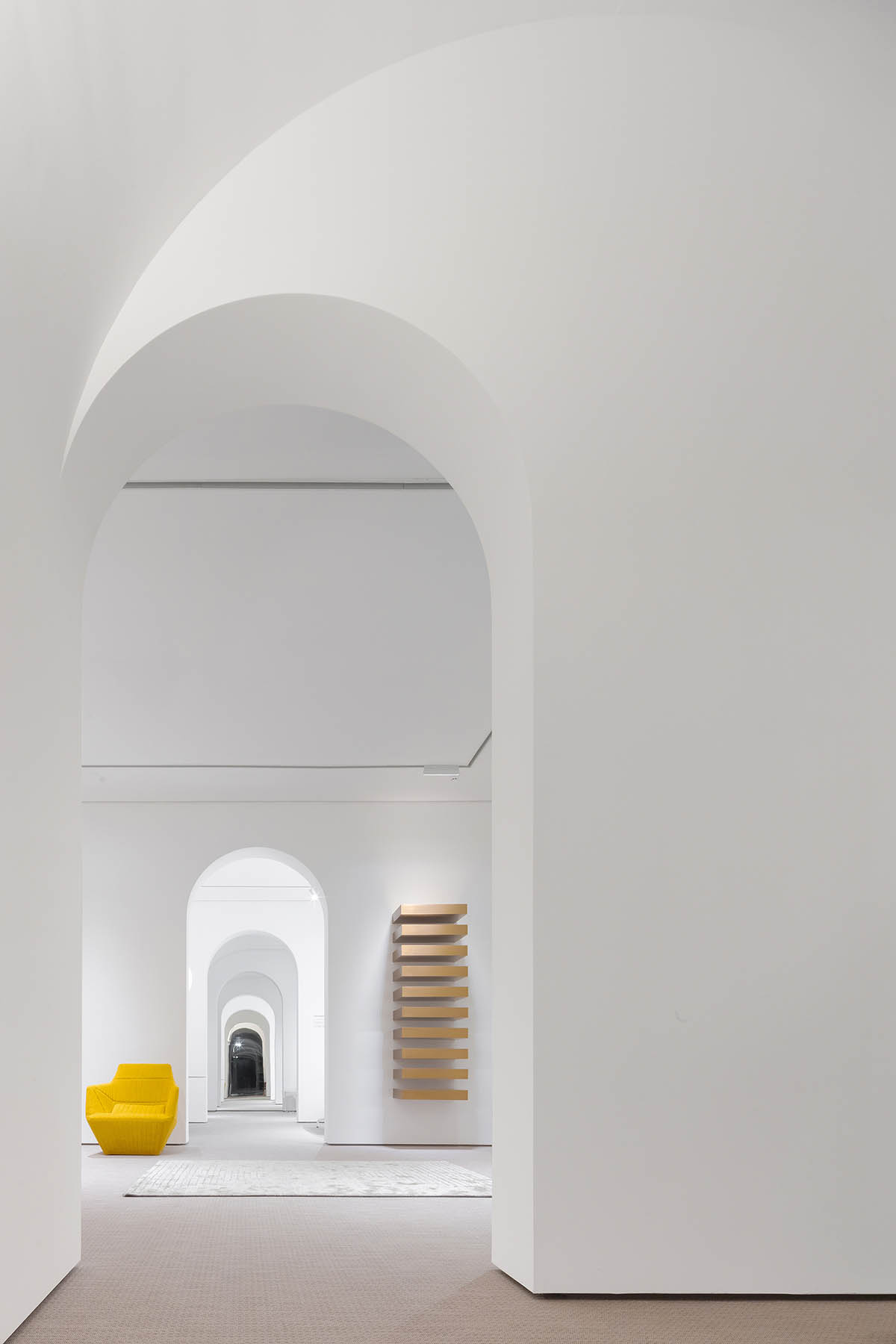 Peng & Partners designs showroom with continuous arches and themed spaces in Guangzhou