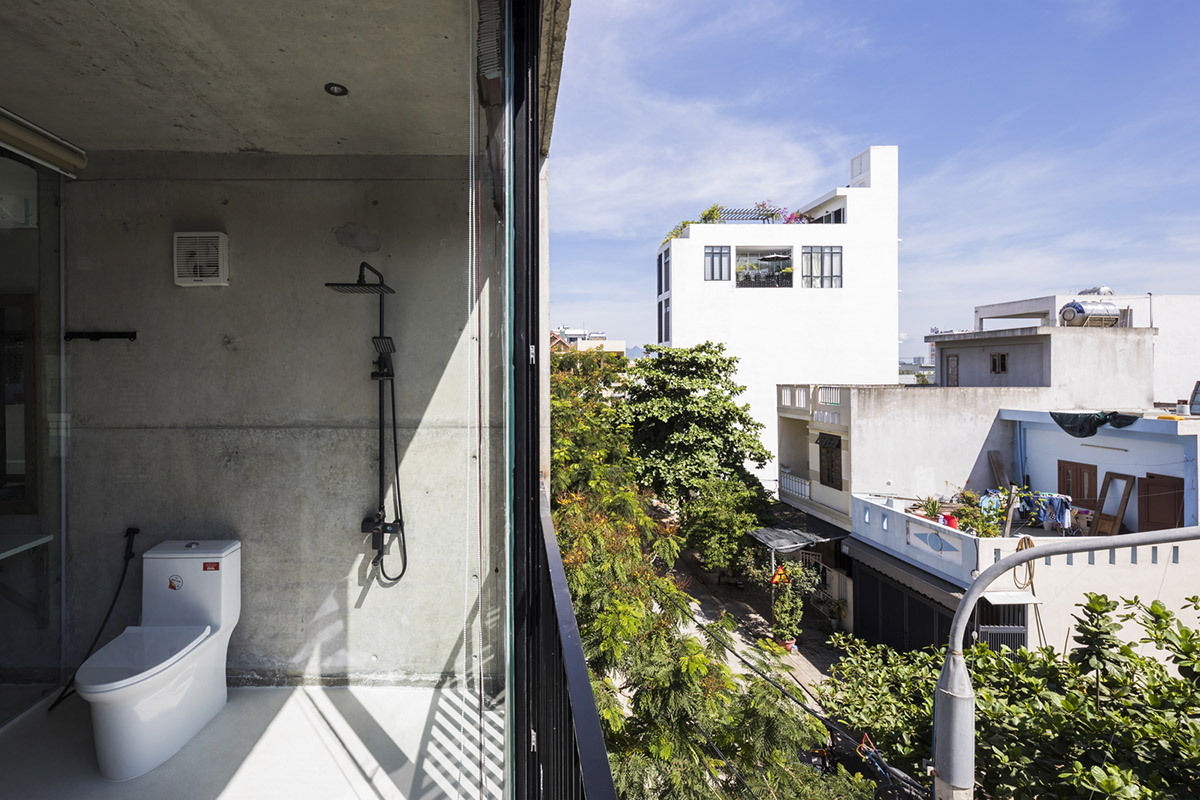 Ho Khue Architects' concrete house is inspired by imaginations of children’s LEGO game in Vietnam