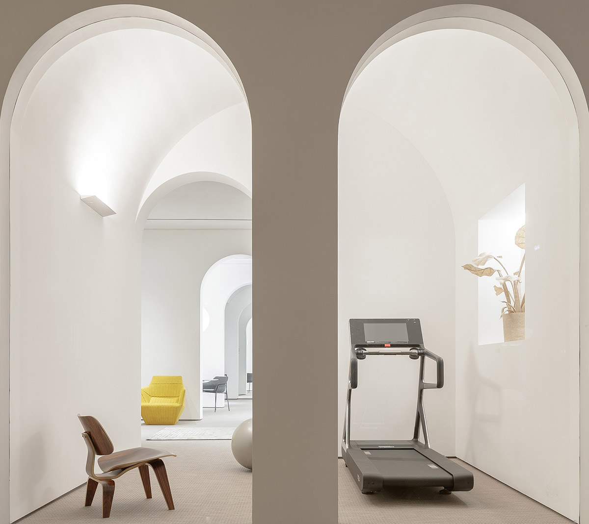 Peng & Partners designs showroom with continuous arches and themed spaces in Guangzhou