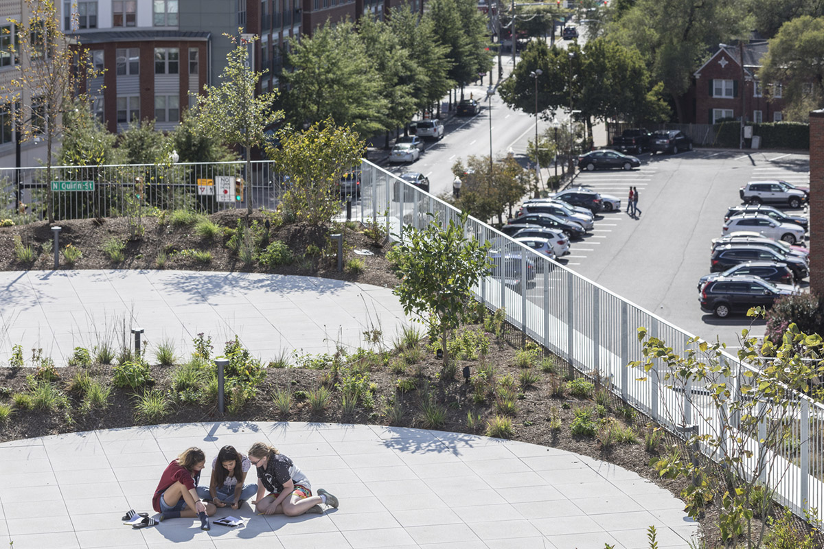 Five rectangular volumes rotating around a fixed pivot point form BIG-designed educational building