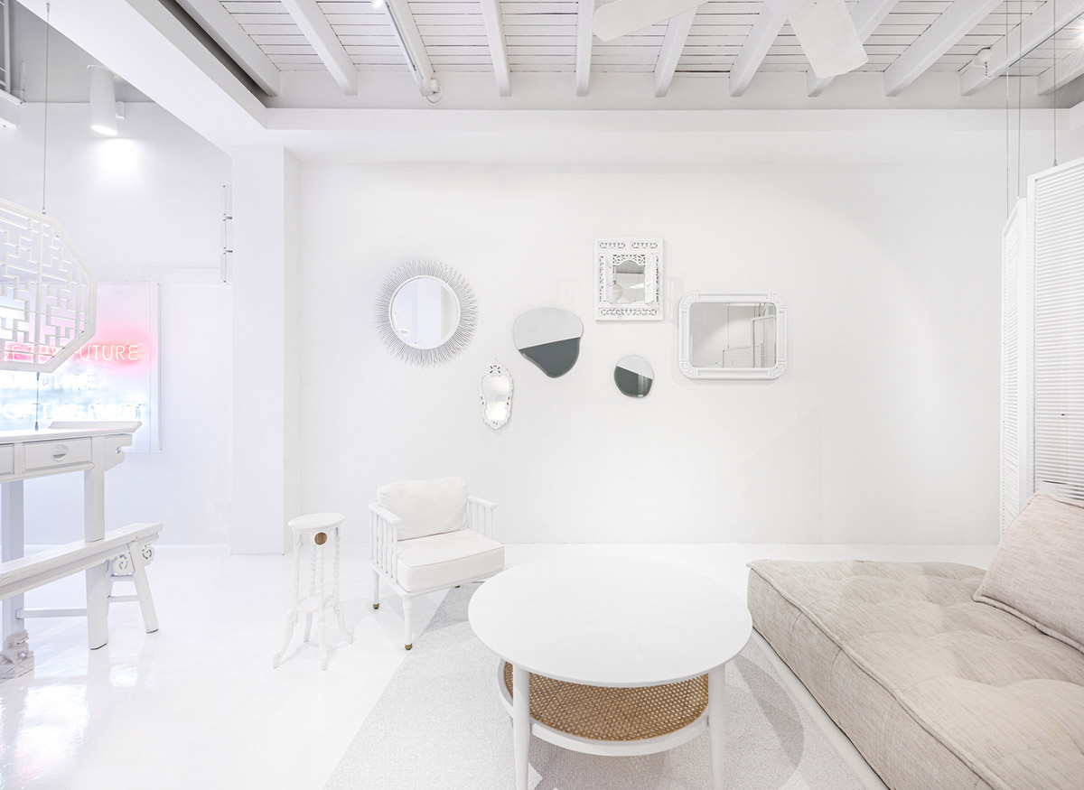Ministry of Design transforms old dwelling in Singapore into co-living house with all-white interiors