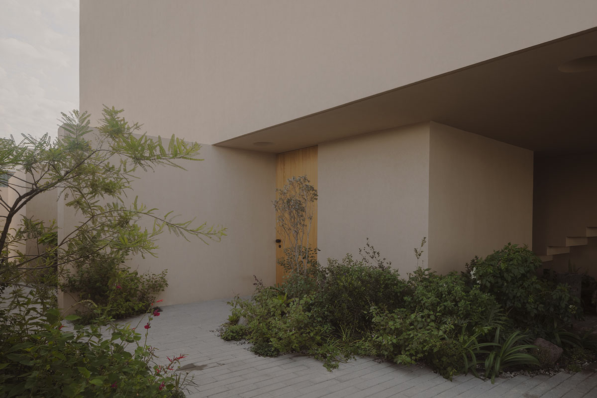 Taller Segovia Molina enriches beige Casa Aguilar with interior patios and an abundance of light
