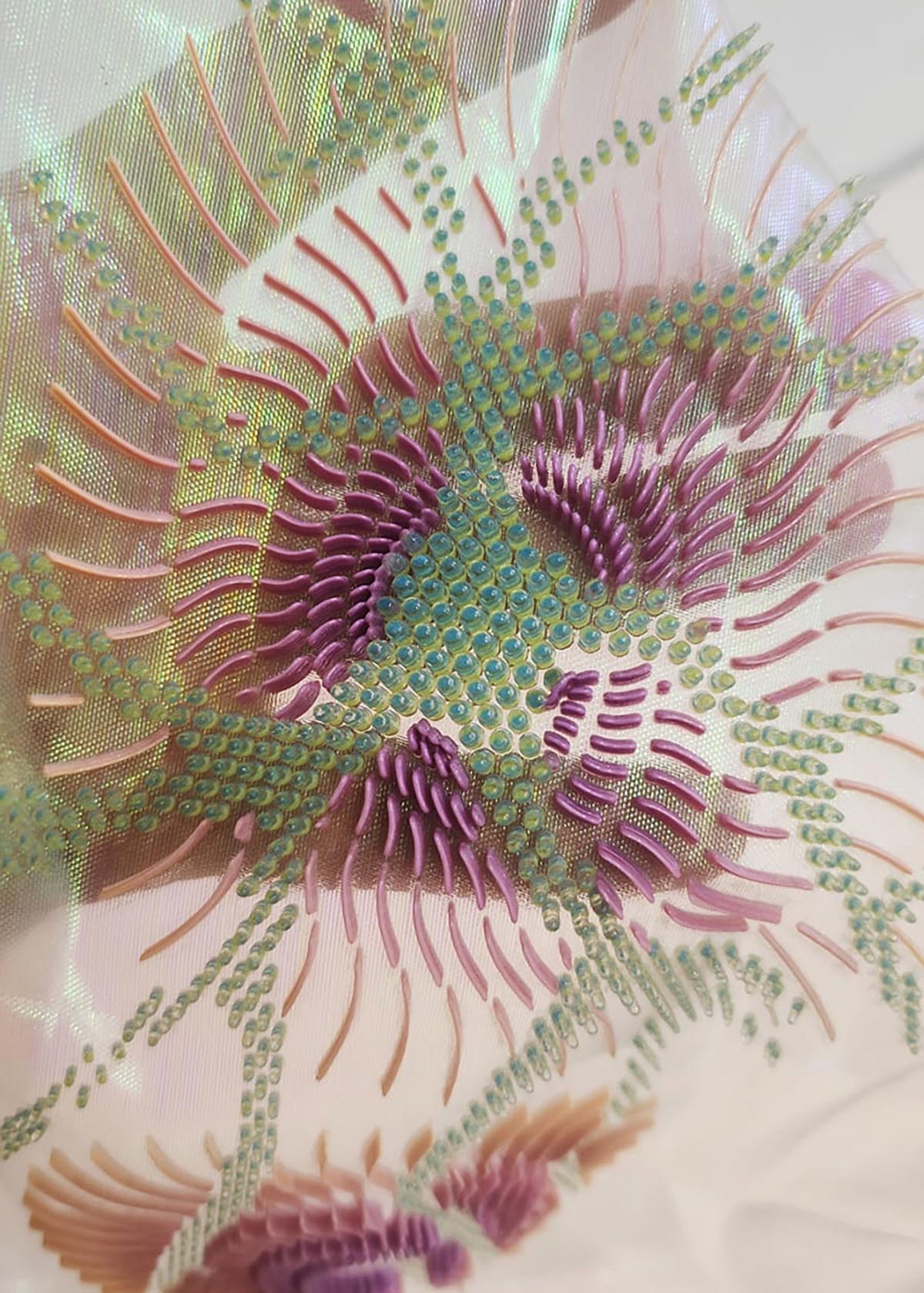 Deond wraps pavilion with 3D corrugated cardboards referencing