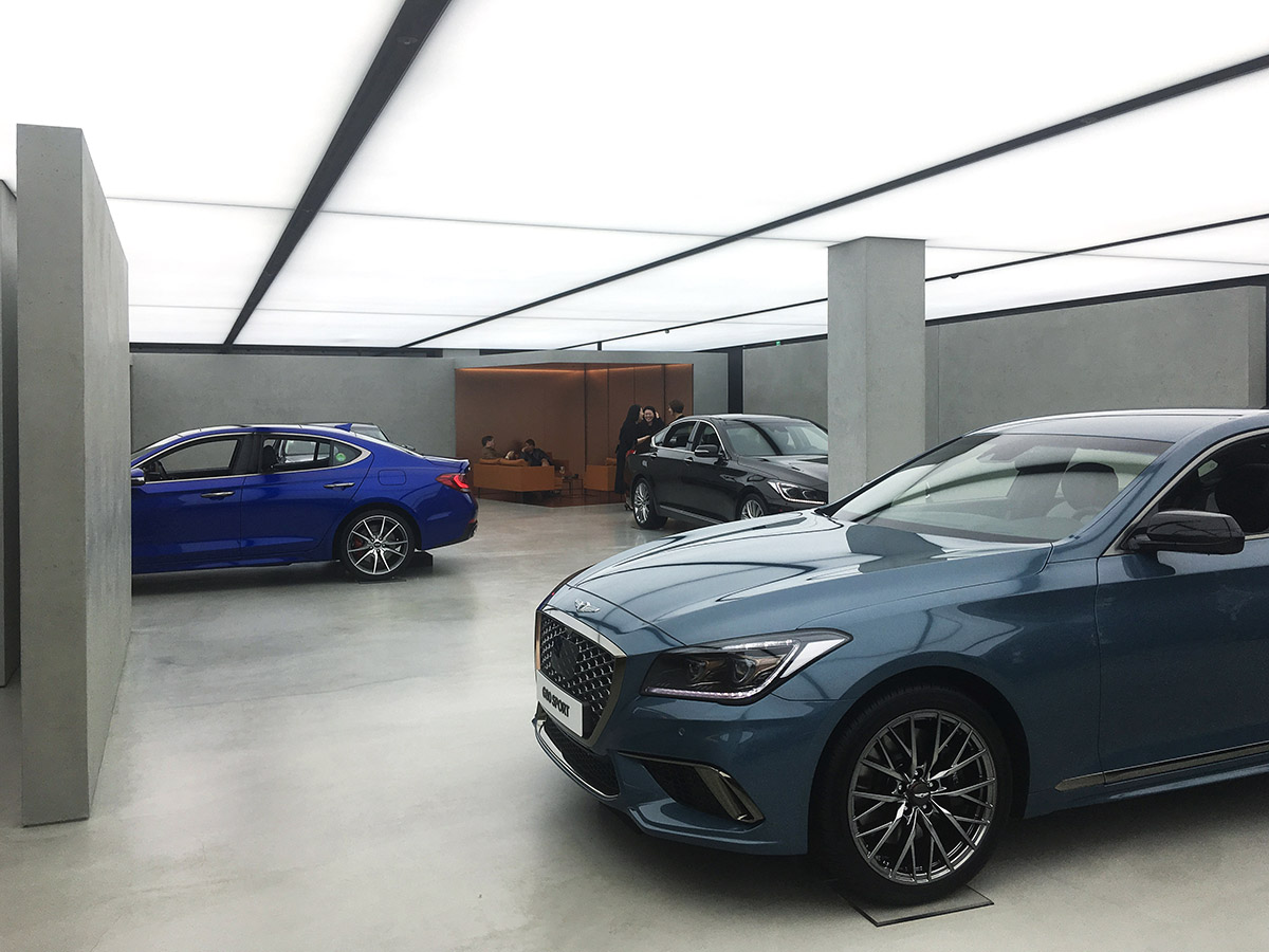 OMA / AMO's new Hundai's Genesis showroom presents cars like 