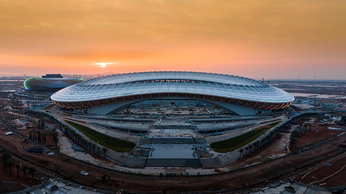 ZHA's Greater Bay Area Sports Centre, featuring distinctive layered roof, nears completion in China