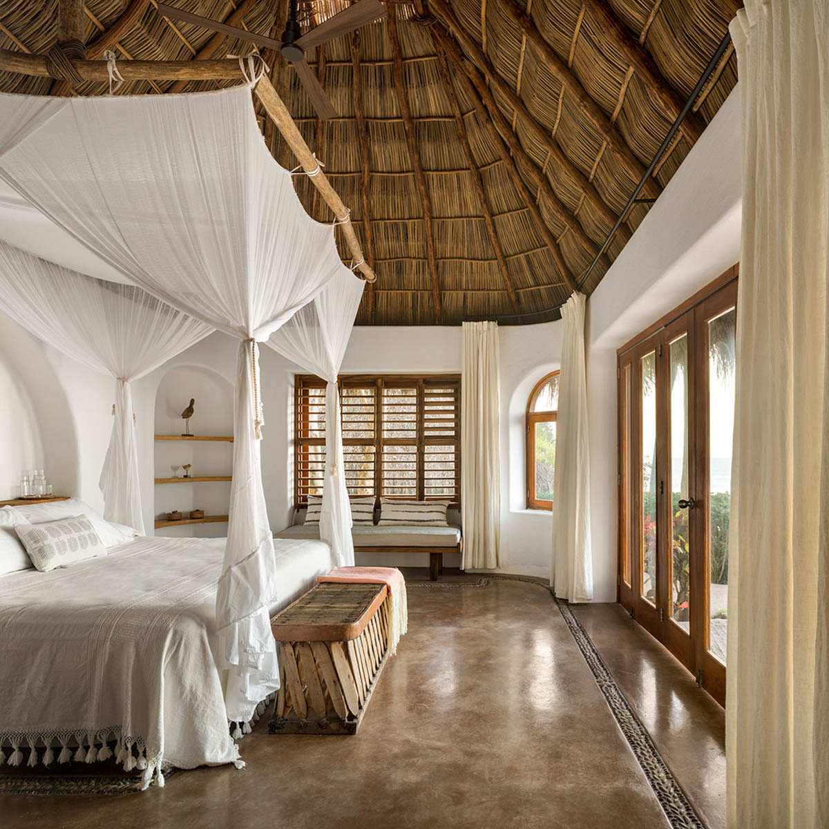 MAIN OFFICE adds half-circle yoga platform to thatched-roof guest villas in Sayulita, Mexico