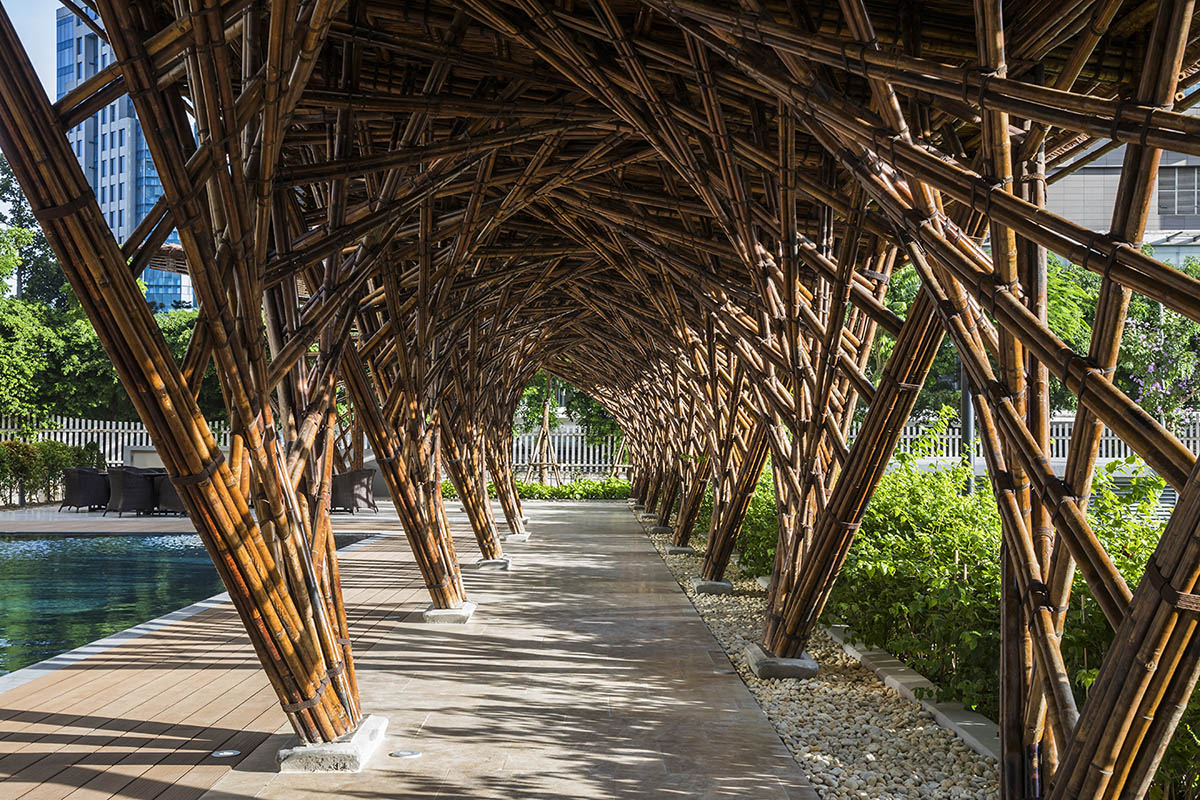 VTN Architects' Vinata Bamboo Pavilion creates a natural pathway in a garden of high-rise buildings