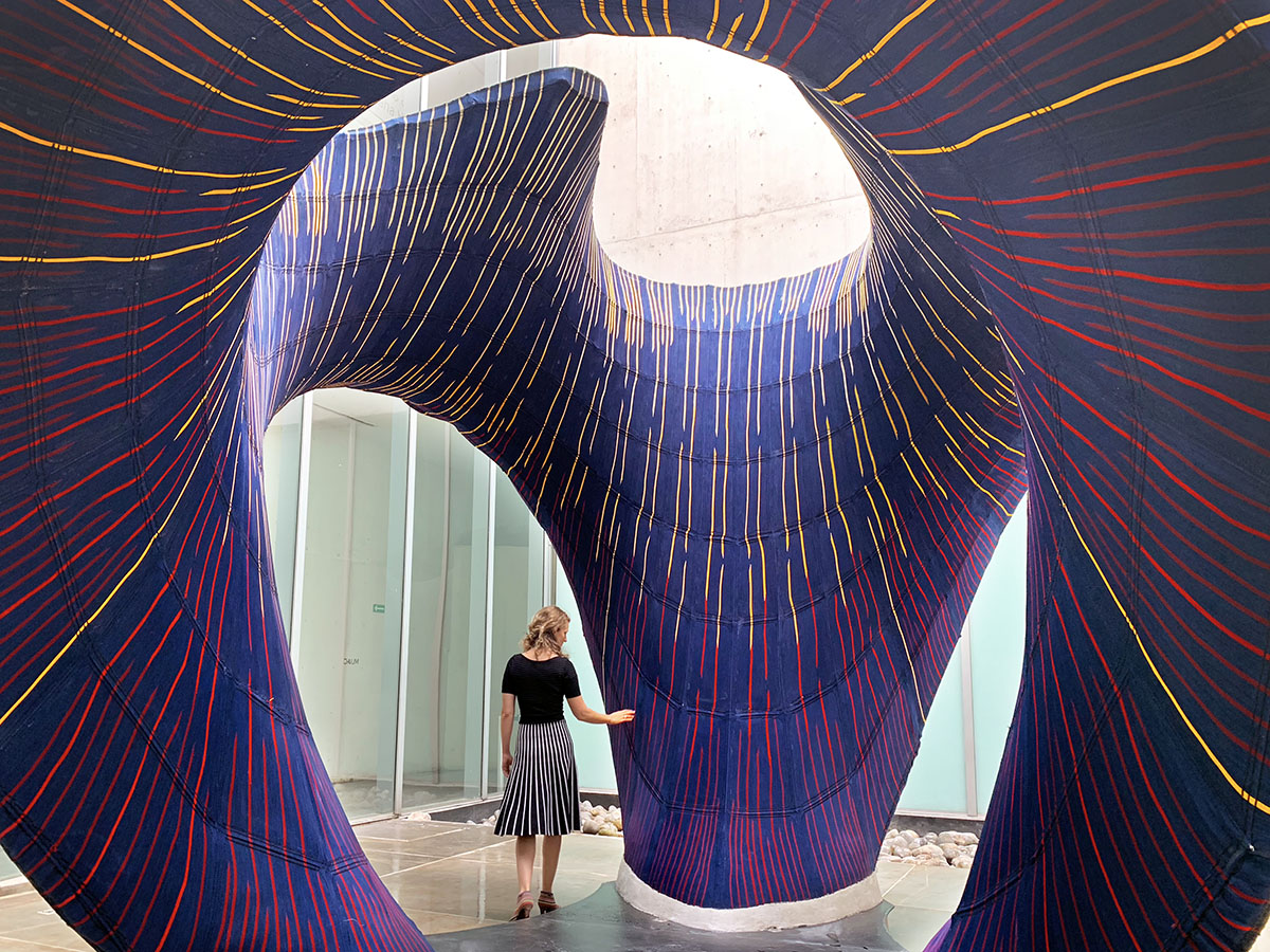 Zaha Hadid Architects designed a sinuous concrete shell for its first ...