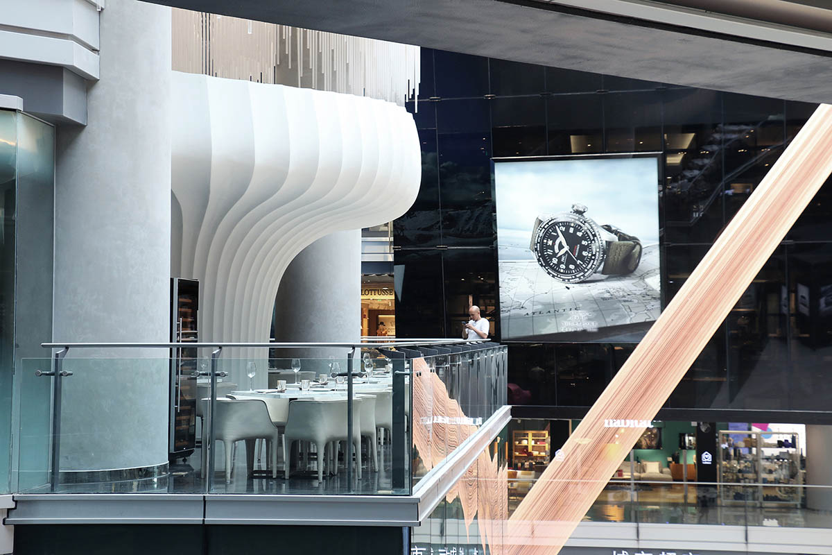 CAA Architects creates flower-like double-deck terrace in the interior of restaurant in Beijing