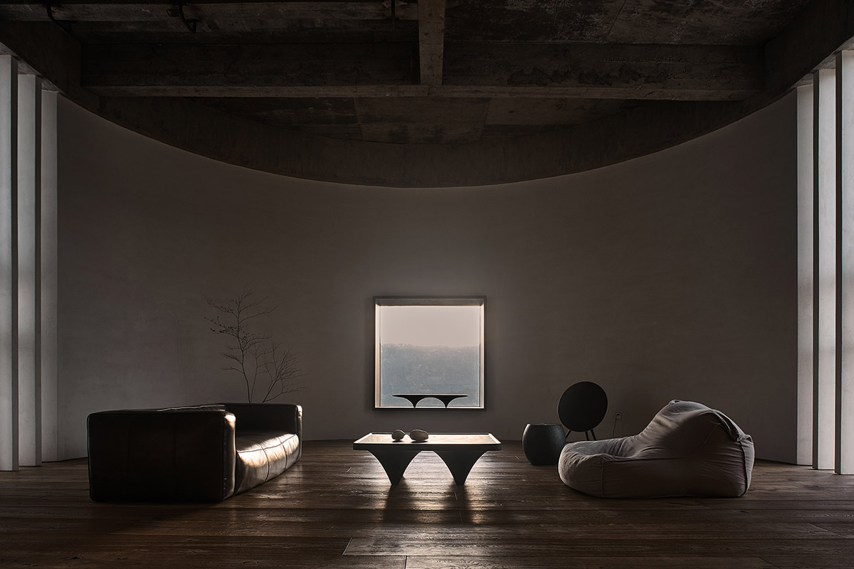 ZMY Design creates earth-toned interiors for a woodwork enthusiast’s house in Fujian, China