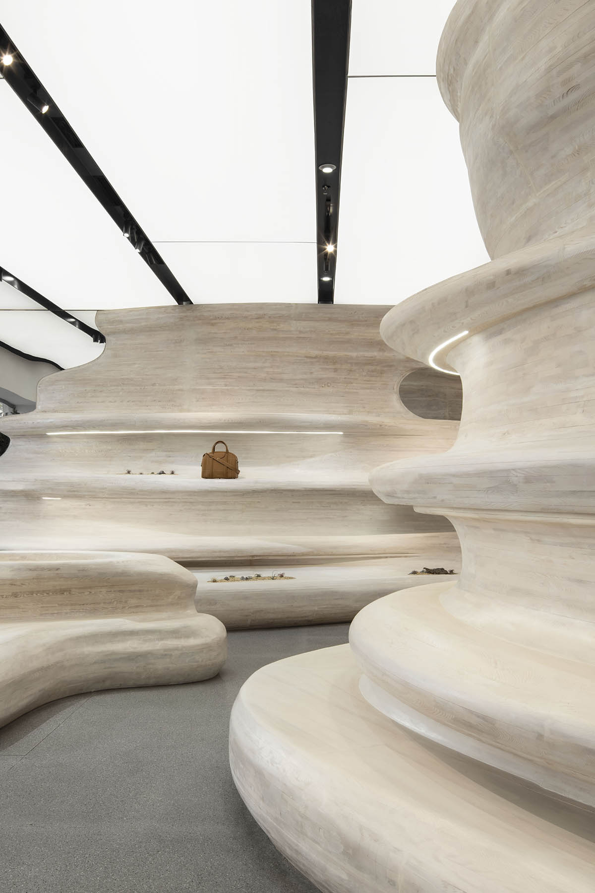 Interiors of Songmont Huaihai Road Store mimic wind-sculpted canyons in Shanghai
