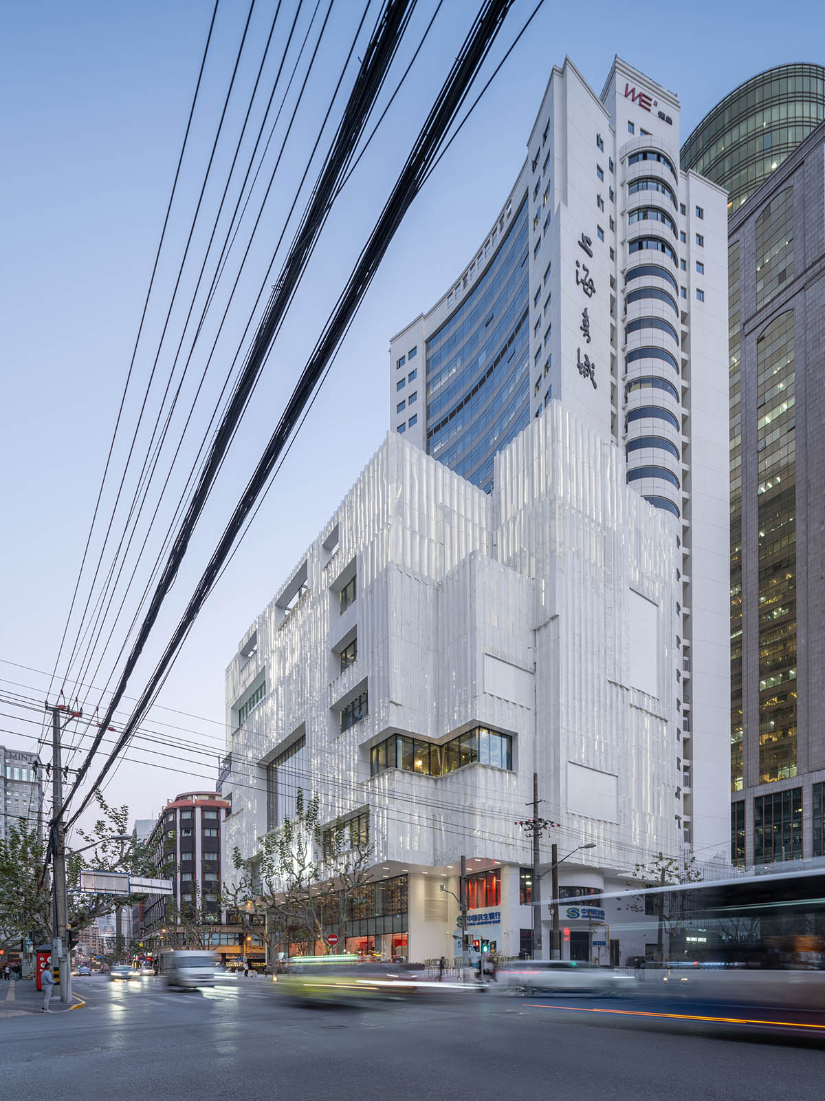 Shanghai Book City by Wutopia Lab clad in perforated metal panels giving a dazzling effect