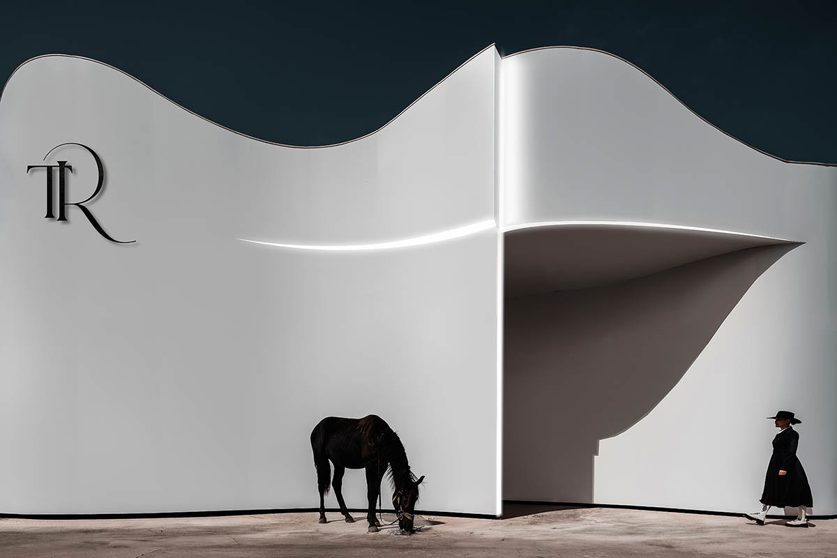 Chinese chapel creates a fluid silhouette featuring curving walls to mimic blossoming petals 