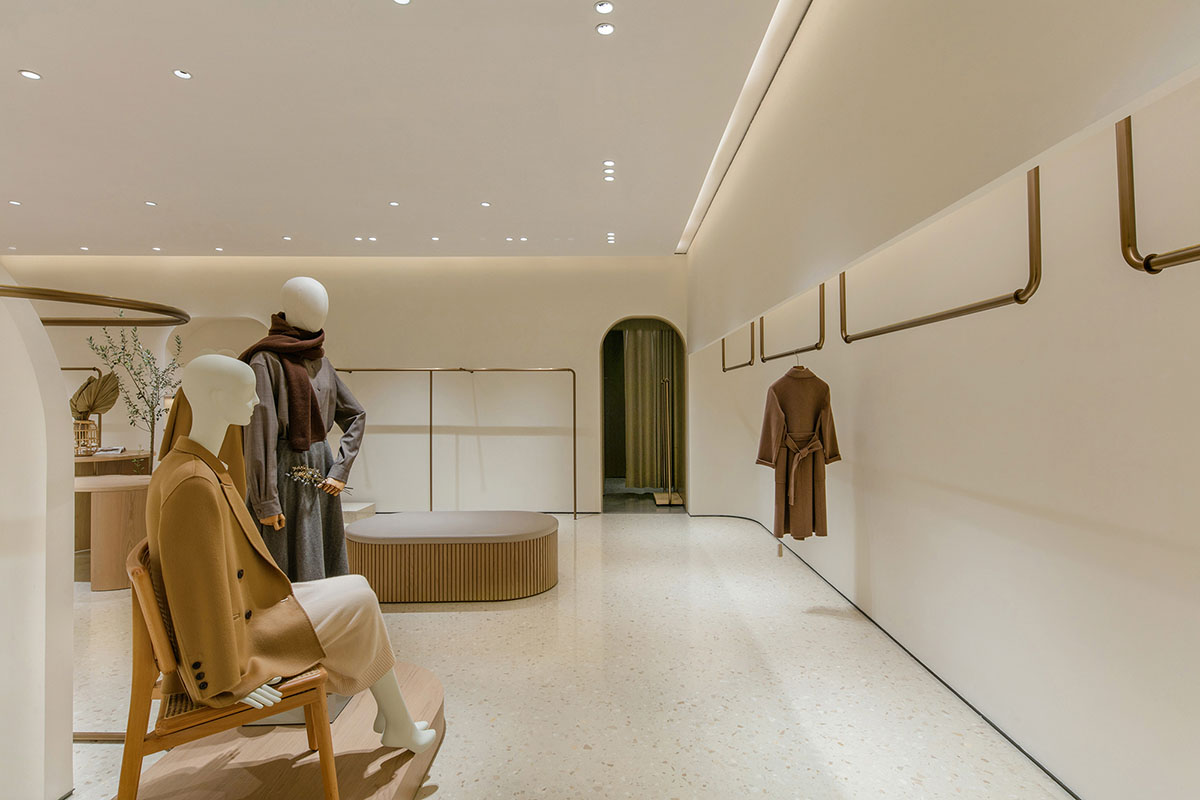 JYDP designs retail space with warm tones and curved walls in Shanghai