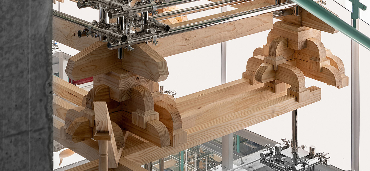 BloomDesign combines stainless steel tubes with timber joints to create retail store in China 