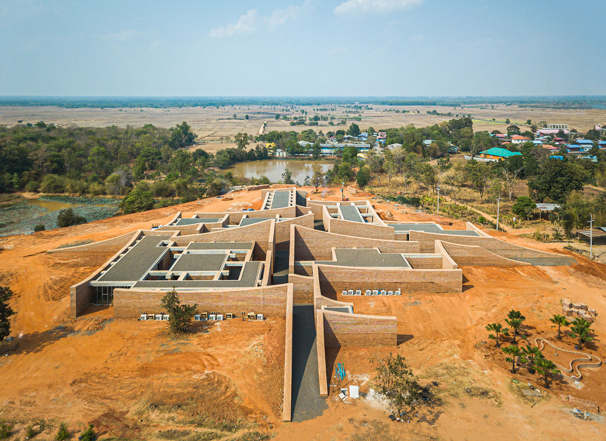 Bangkok Project Studio used over 480,0000 fired clay bricks to form elephant museum with curved walls