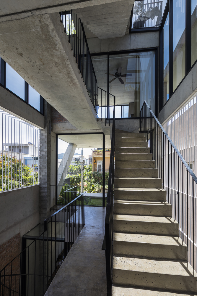 Ho Khue Architects' concrete house is inspired by imaginations of children’s LEGO game in Vietnam