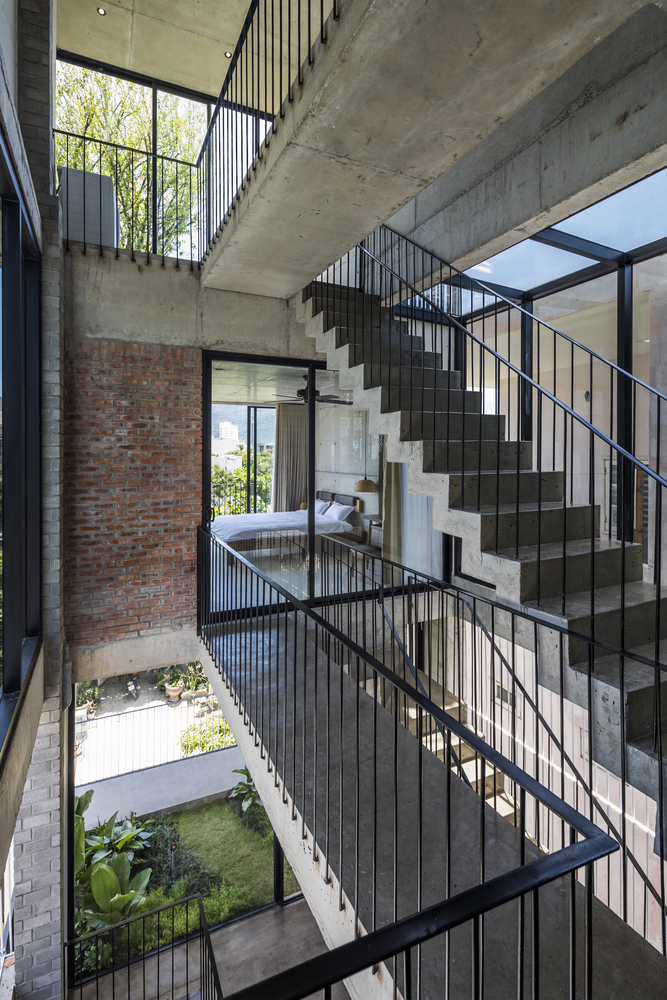 Ho Khue Architects' concrete house is inspired by imaginations of children’s LEGO game in Vietnam