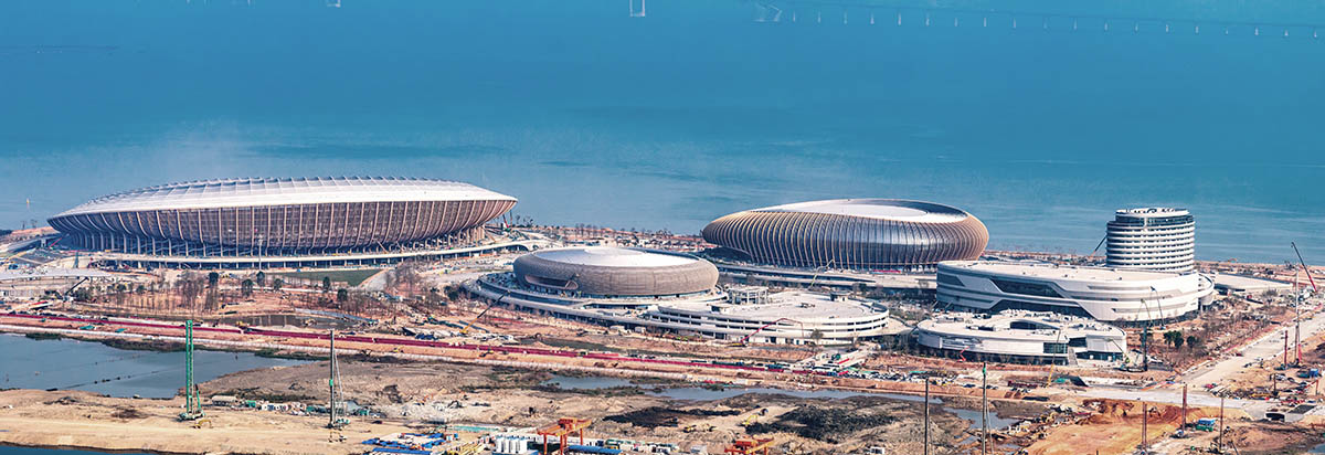 ZHA's Greater Bay Area Sports Centre, featuring distinctive layered roof, nears completion in China