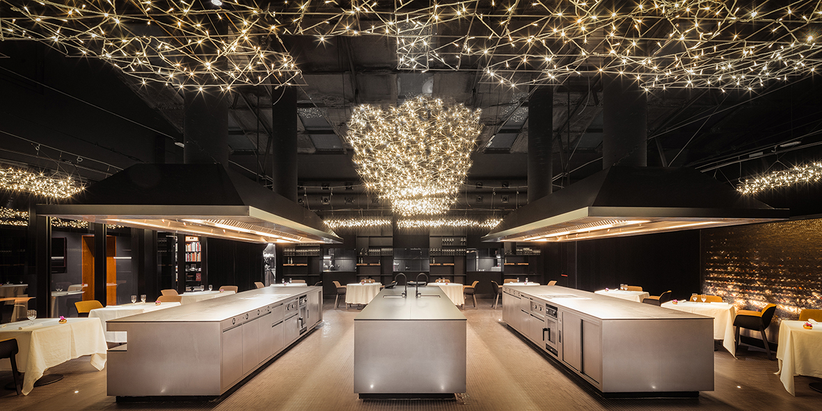 OAB transforms an old industrial warehouse into a kitchen and restaurant in Barcelona