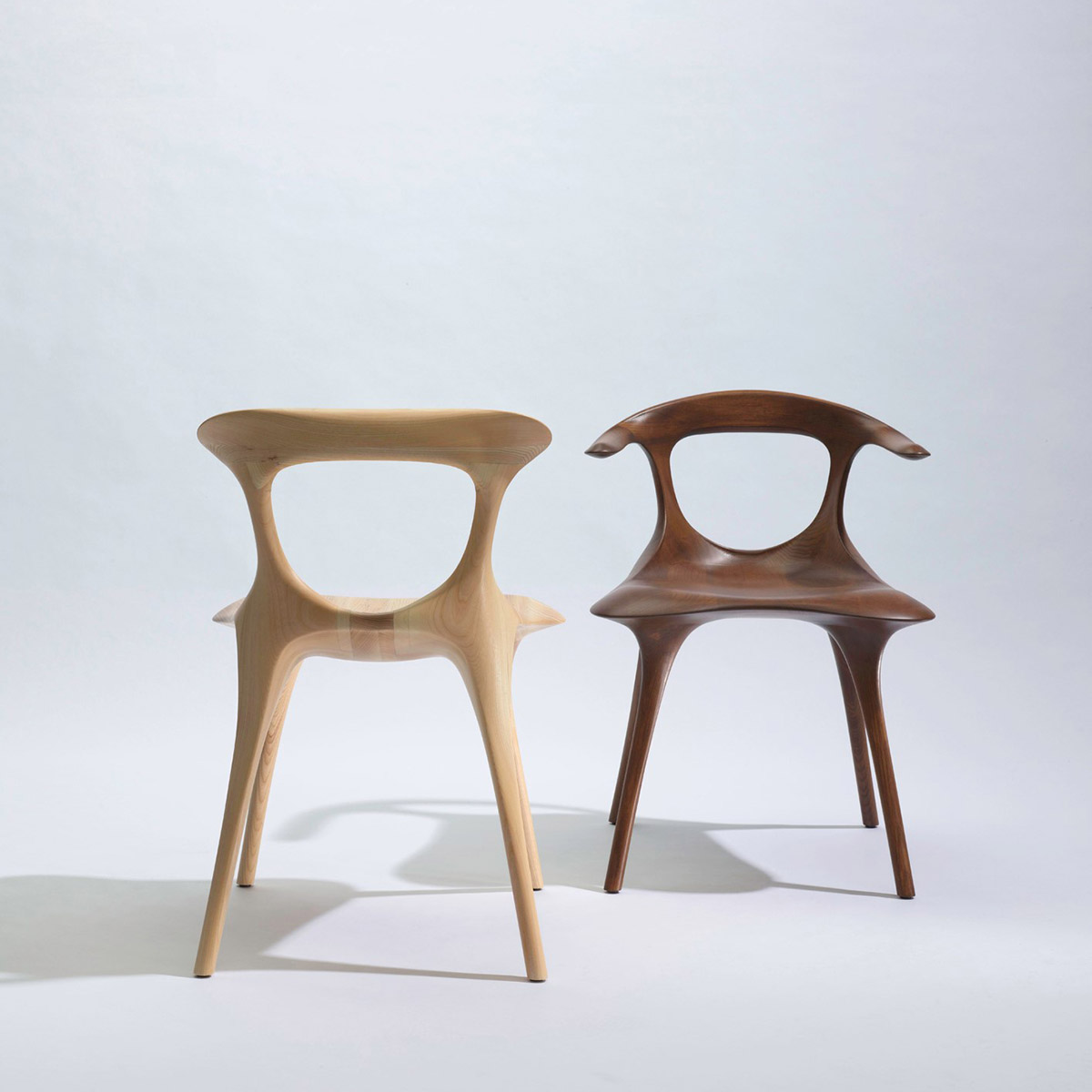MAD reinterprets traditional wooden chairs with fluid geometry for Sawaya & Moroni