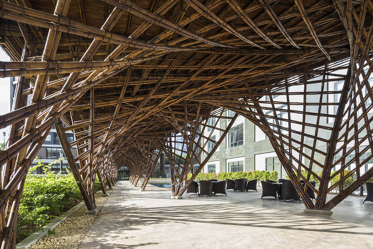 VTN Architects' Vinata Bamboo Pavilion creates a natural pathway in a garden of high-rise buildings