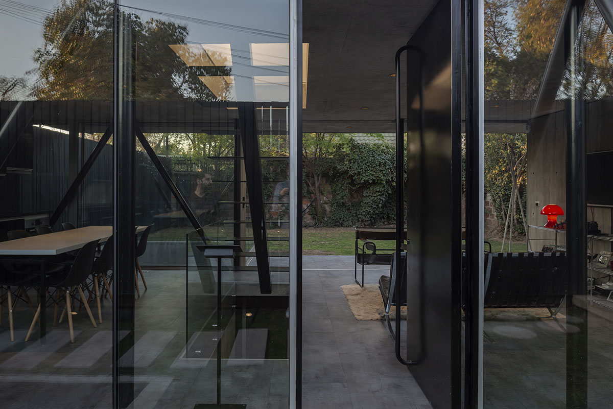 Rodolfo Ca&ntilde;as' hermetic family house defined by protruding skylight in central Chile