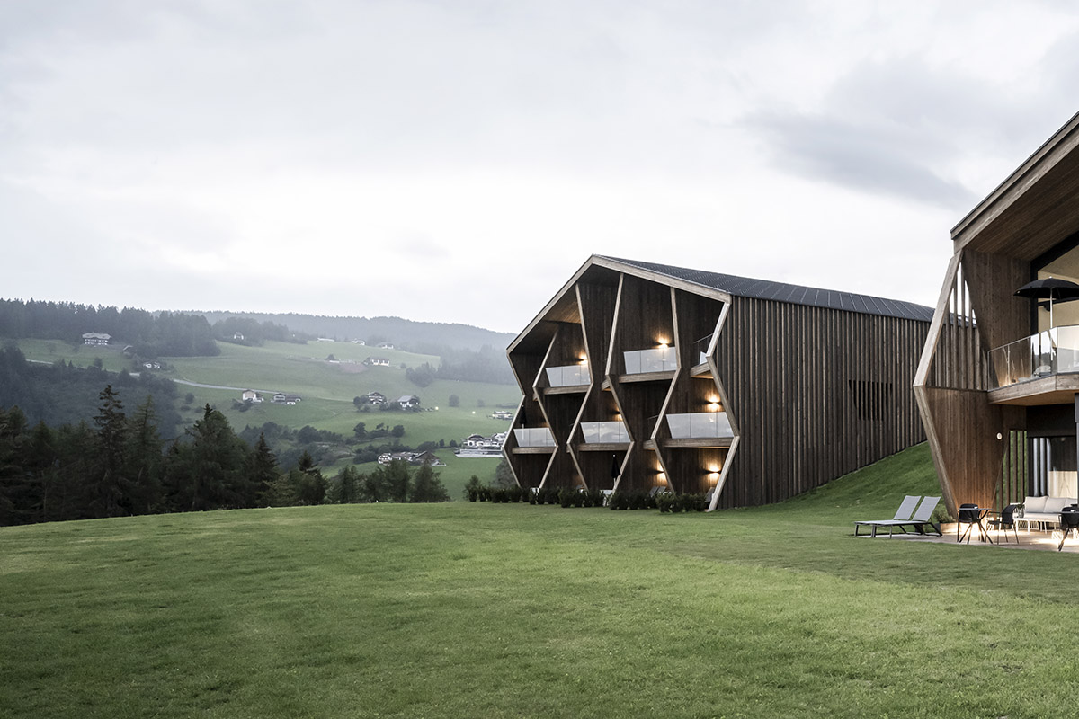 noa* designs boutique hotel and wellness featuring trapezoidal façade in an old farm of Soprabolzano