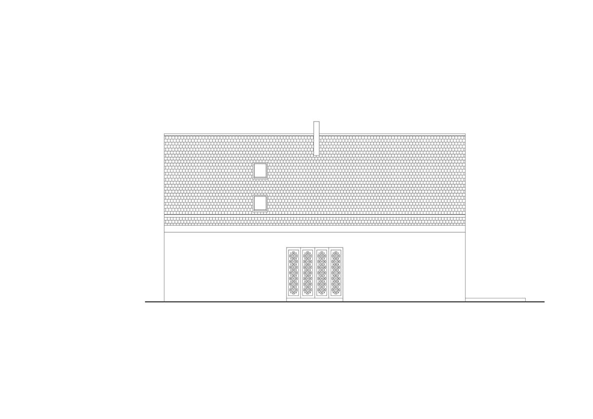 Jan Žaloudek Architekt converts a Baroque barn into a light-filled house with perforated gable wall