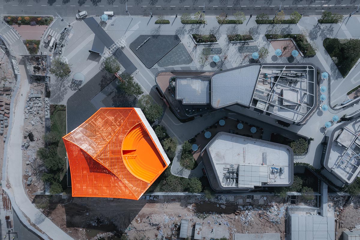 Wutopia Lab built showroom evoking Chinese red mountains with dazzling orange-colored roof