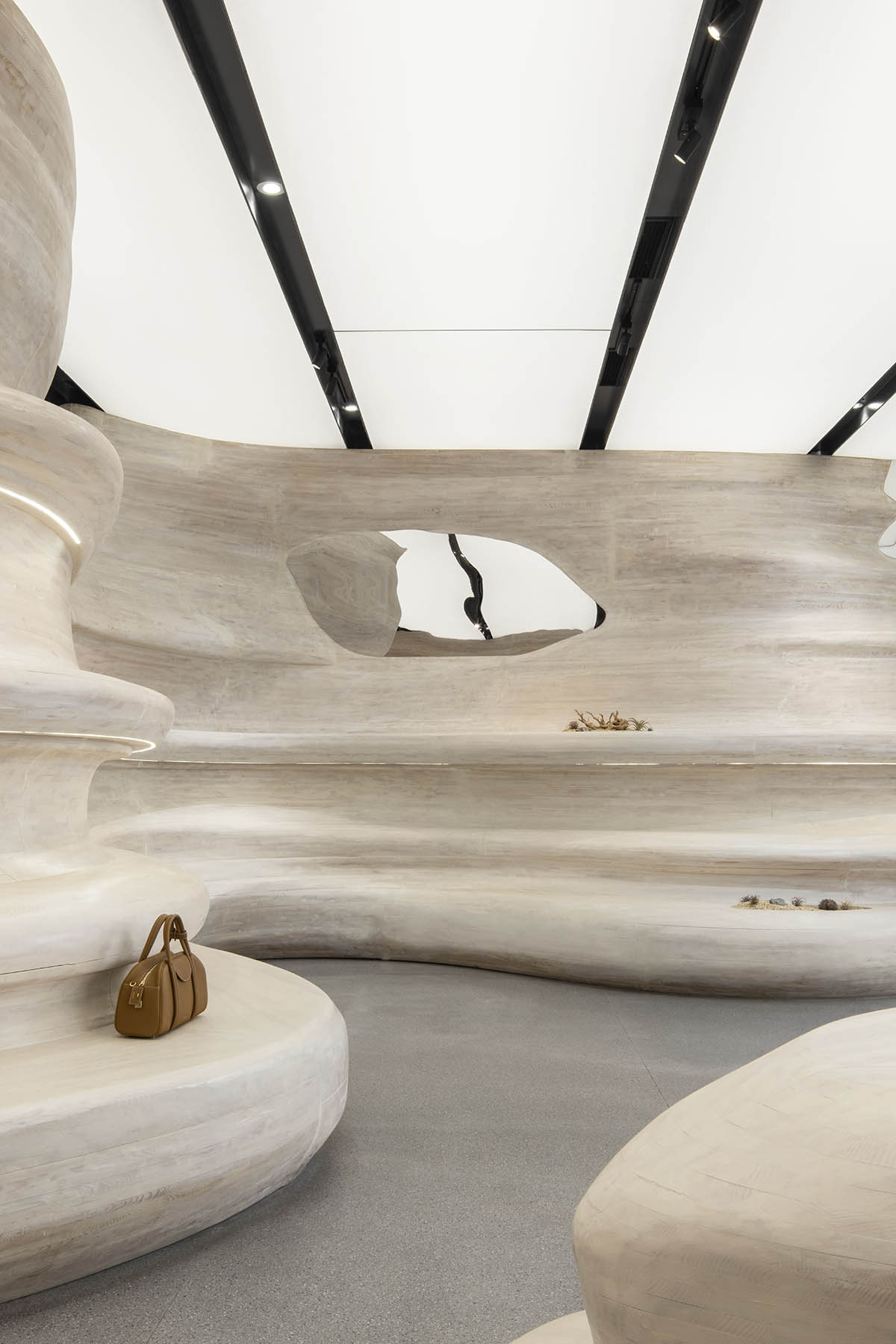 Interiors of Songmont Huaihai Road Store mimic wind-sculpted canyons in Shanghai