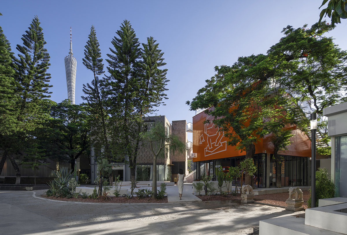 Wutopia Lab completes orange-colored vertical micro social complex with light tower in Guangzhou