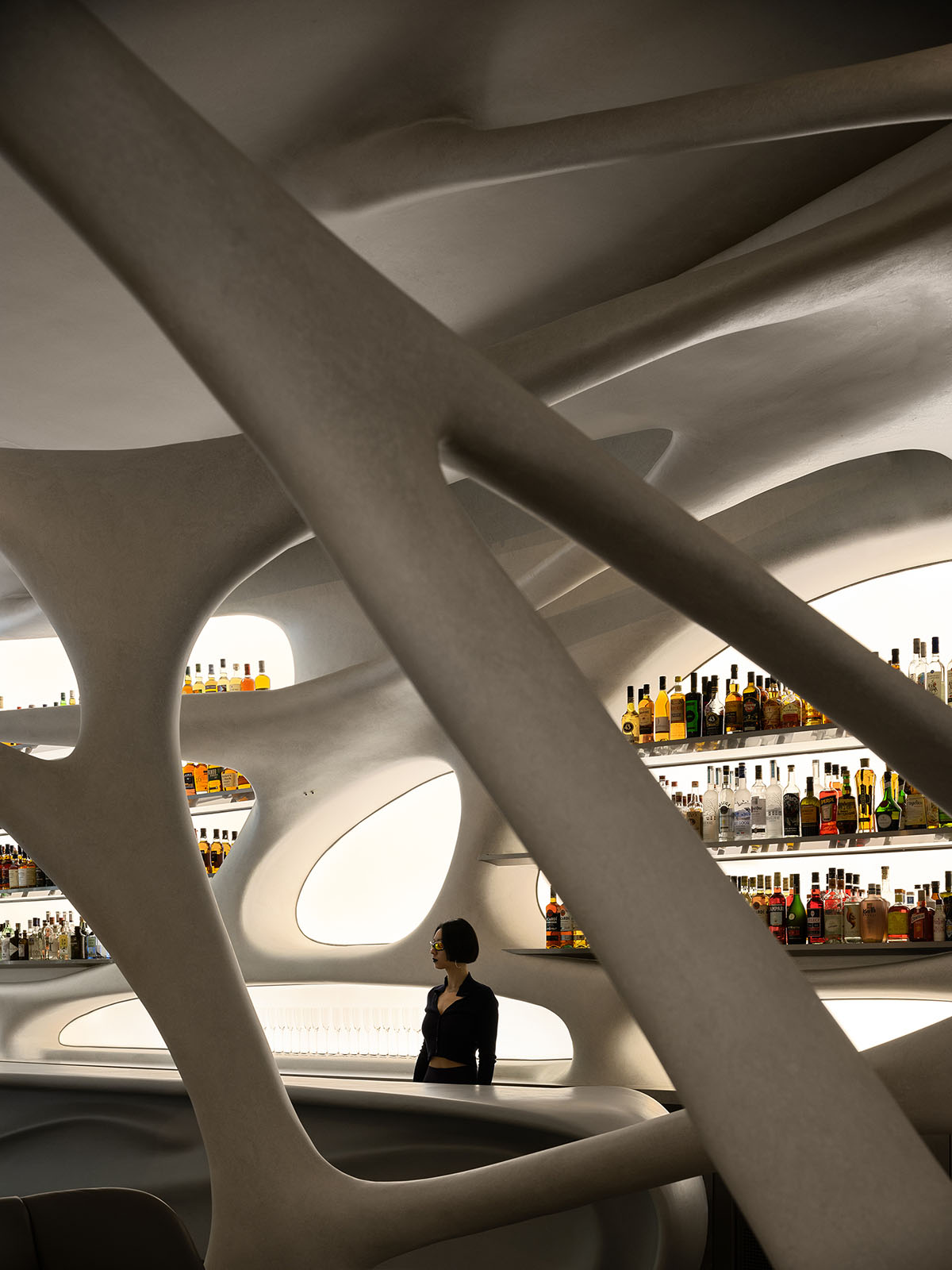Neuron-like interior by AD ARCHITECTURE combines purity and complexity for cafe and bar in Shenzhen
