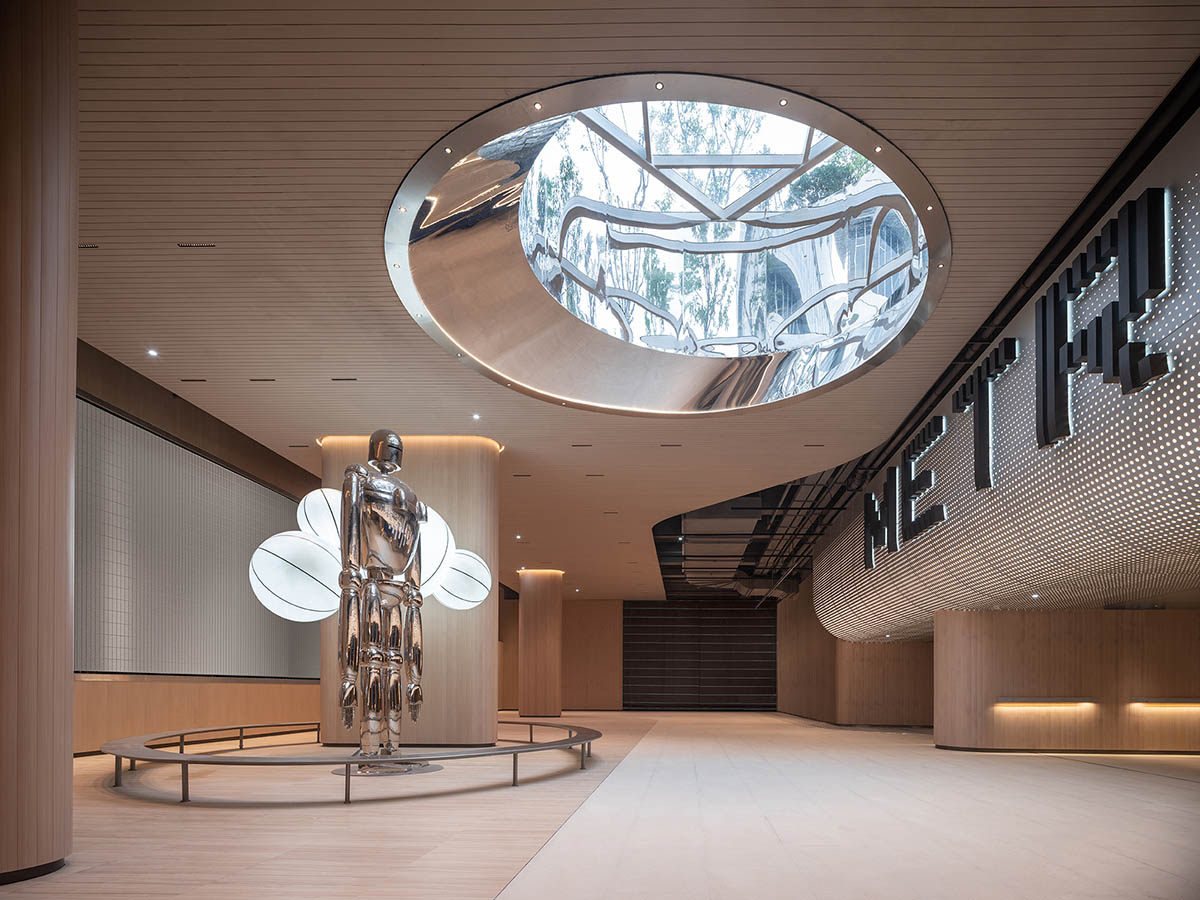 TOMO Design creates interiors for metro station with soft wood hues and circular light strip