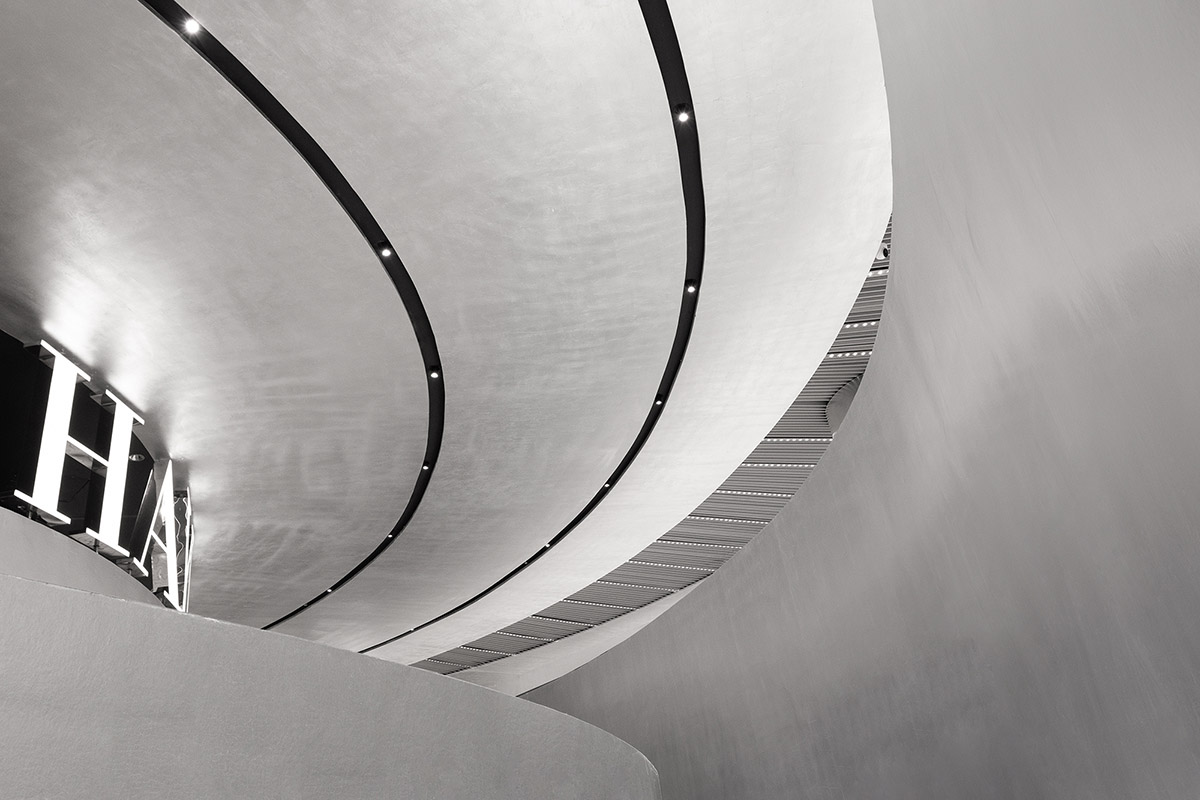 Various Associates designs beauty store with winding staircase and silver-toned interiors in Hangzhou