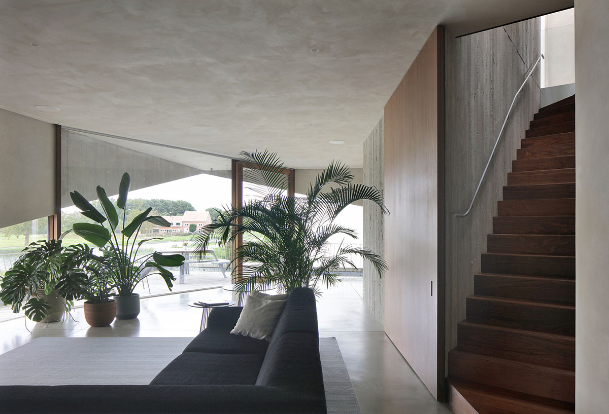 Belgian house by GRAUX & BAEYENS Architecten features asymmetrical angled concrete canopies